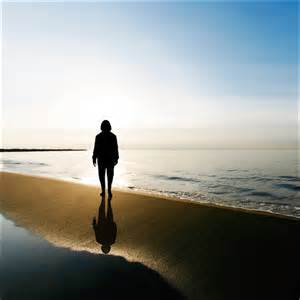 silhouette of woman on beach